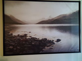 Picture of mountains hovering over waters
