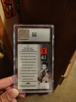 Graded 9.5 Muhammad Ali card in excellent condition in a hard case