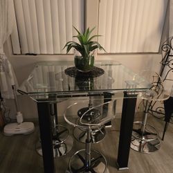 Glass Counter Height Dinning Table And Acrylic Stools 