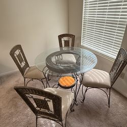 Glass table with 4  chairs