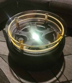 Corvette wheel coffee table conversion with light