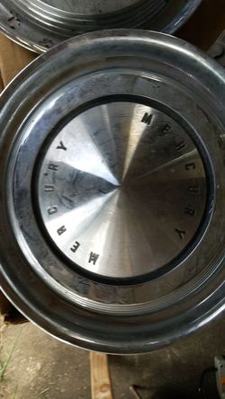 Pair of vintage Mercury hubcaps