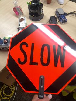 Stop and slow sign