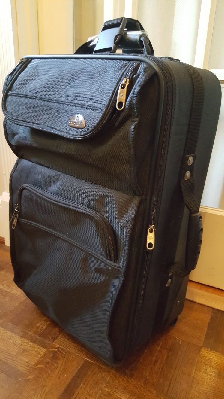 New black Samsonite carry-on luggage