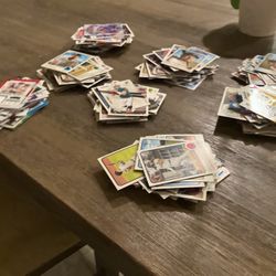 Lots Of Baseball And Football Cards Various Years And Packs. Good Condition. ALL CARDS SCANNED ON COLLX APP FOR PRICING. Can Show Proof If Buying.