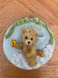 Used November Angel Bear plaque/ornament