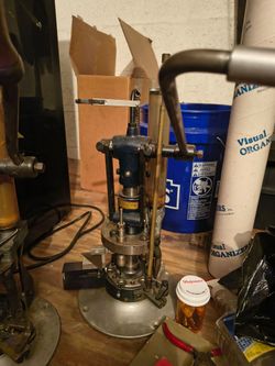 vintage Texan / Western Arms shotshell reloading press (specifically built by Western Arms / Texan Machine Works on a classic circular turret base).