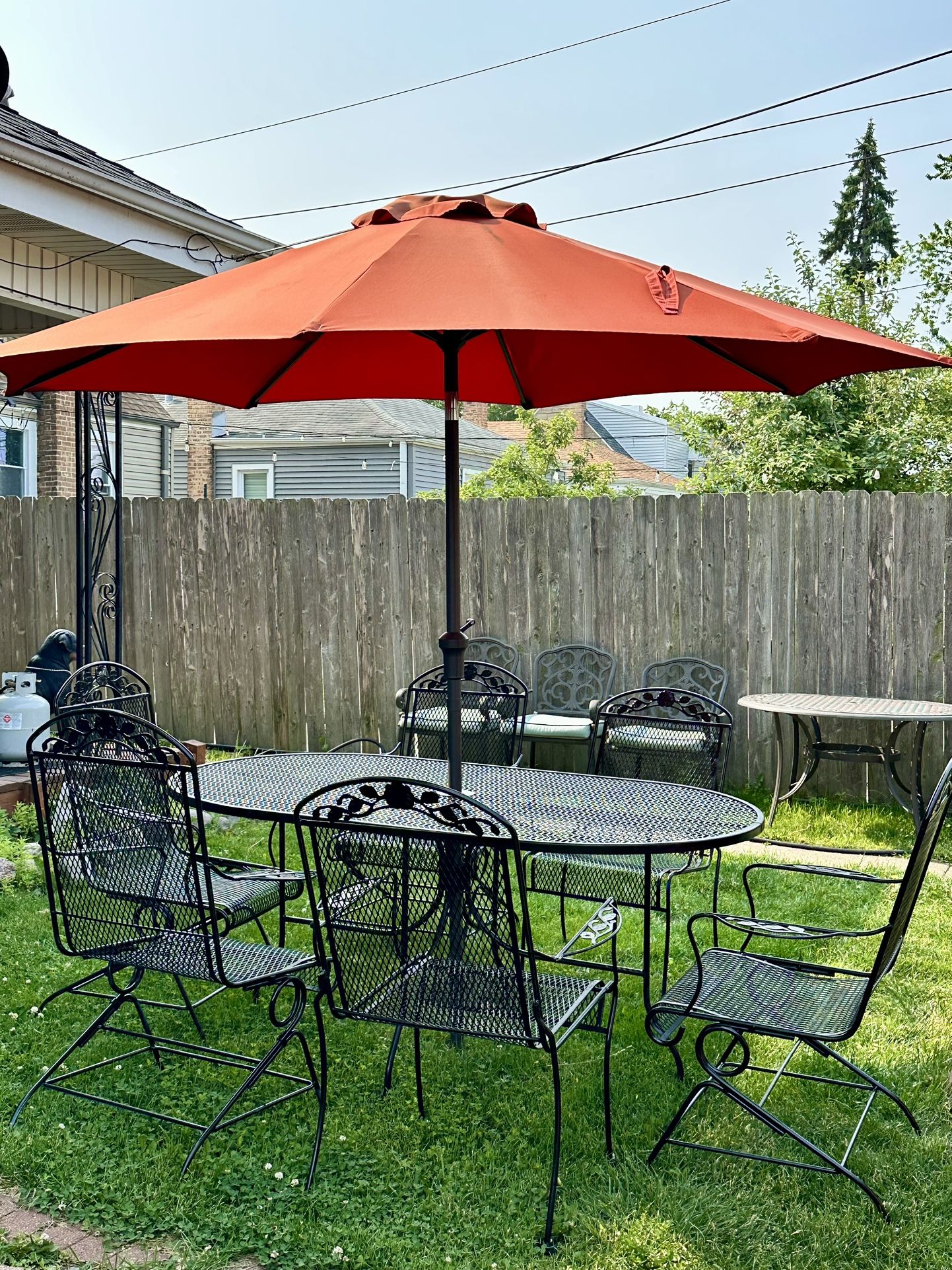 Wrought Iron Patio Set With 6 Chairs And New Umbrella