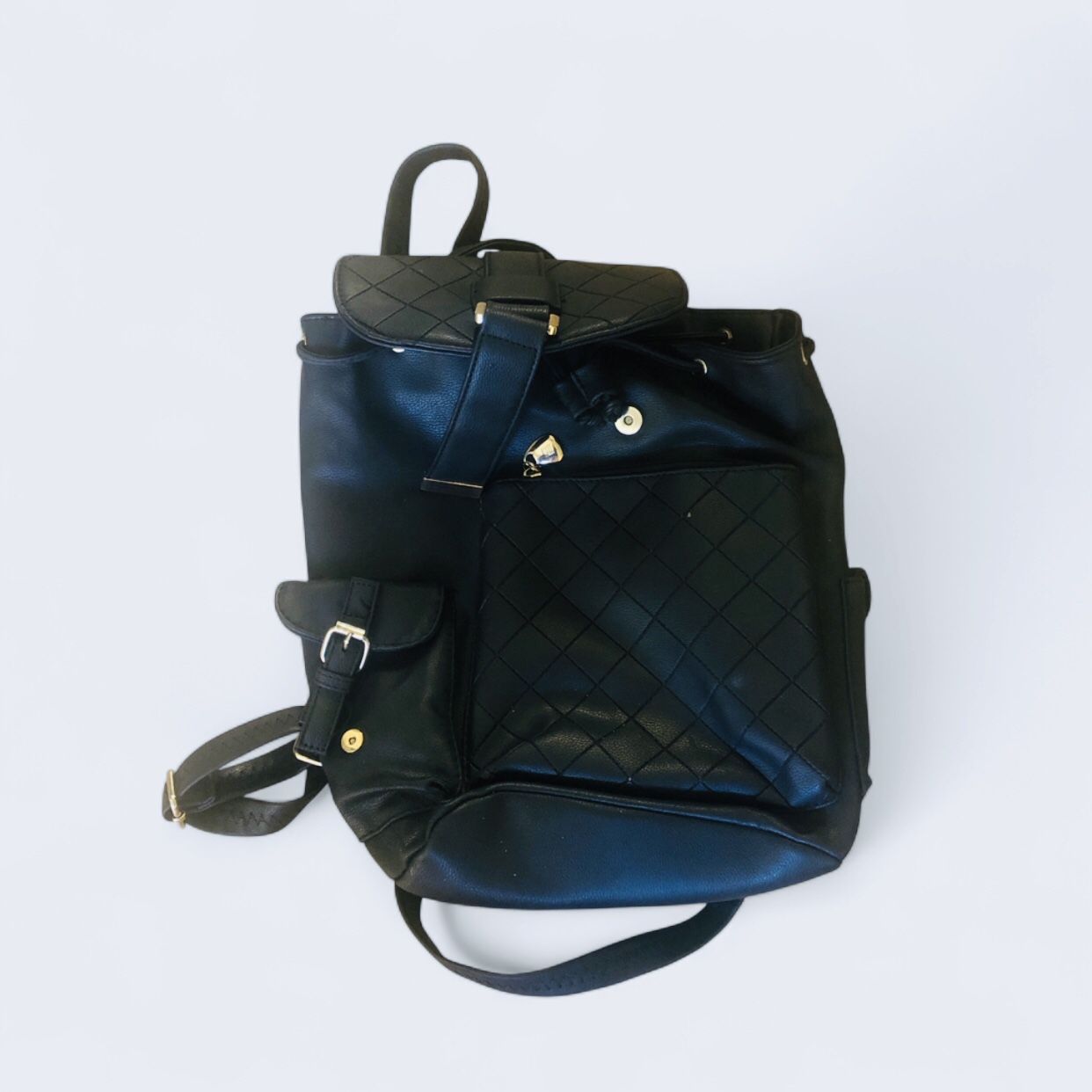 black backpack made of imitation leather.