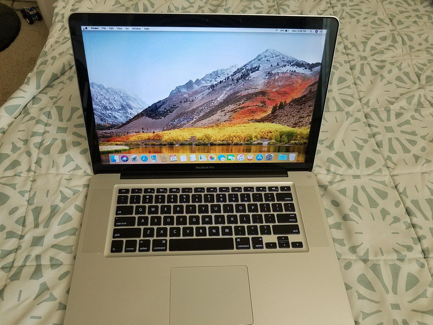 Macbook Pro 15inch Early 2011 with Intel core i7 processor, 8gb Ram, 256gb SSD drive, macOS High Sierra. Comes with charger. New battery.