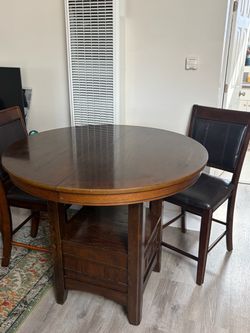 Wood Dining table and two chairs