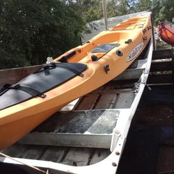 Yellow Kayak And Jon Boat For Sale