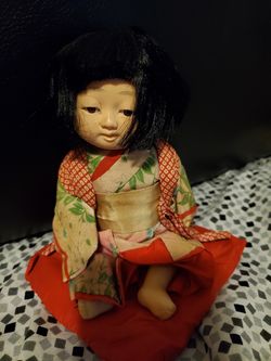 Antique china doll at least 80 years old