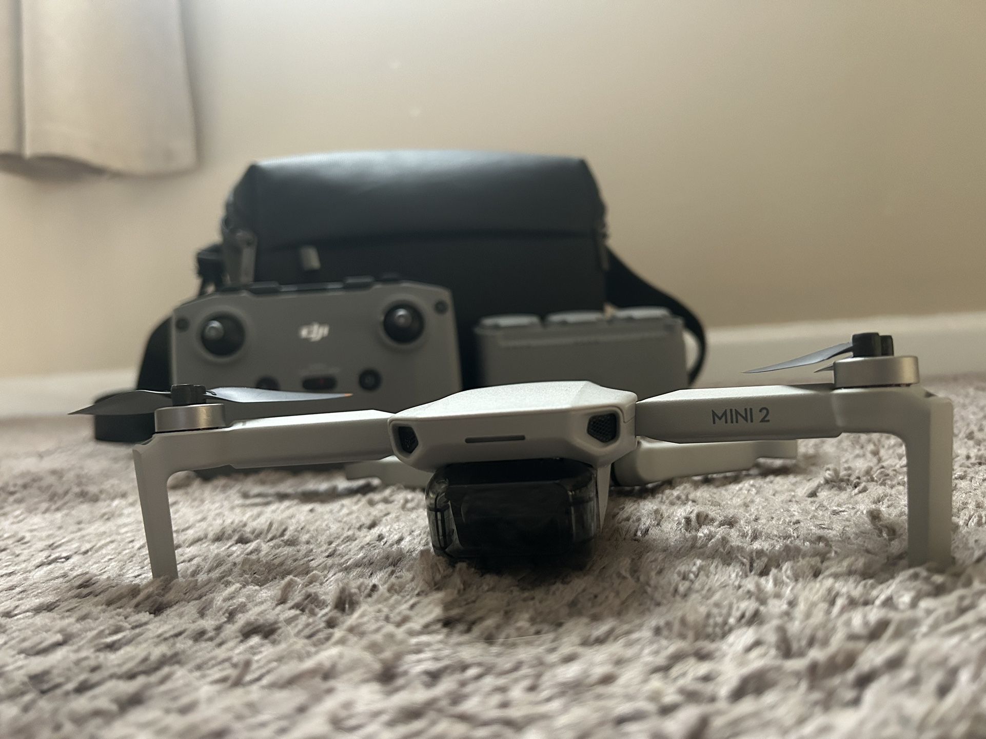 DJI Mini 2 With Controller Chargers And Batteries.