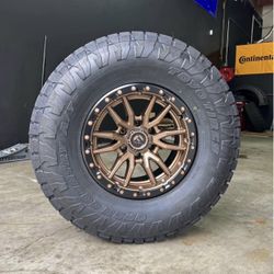 NEW Fuel Rebel Matte Bronze Black Lip Wheels 315/70R17 Toyo Open Country ATIll Tires Package Deal