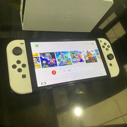 Nintendo Switch OLED Loaded With Games Docks