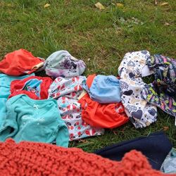 Ten Reusable Diapers For Girls Plus One Onsie