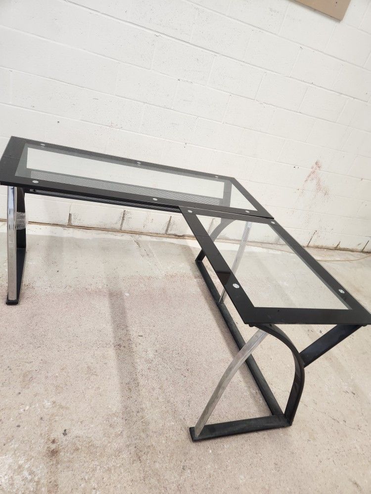 GENTLY USED  L-SHAPE GLASS TOP DESK 56" X 56" X 23 1/2 DEEP X 30 1/2" HIGH. OR YOU CAN  HAVE JUST A STRAIGHT  DESK 56" X 23 1/2" X 30 1/2