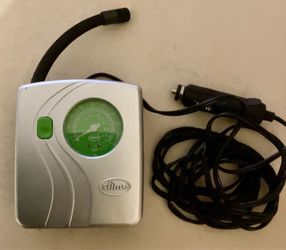 TIRE INFLATOR NEW IN PLASTIC BAG WITH ATTACHMENTS