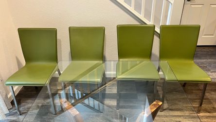 CB2. Steal legs dinning chairs