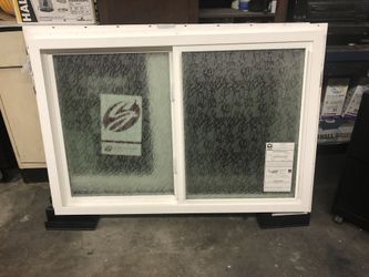 Brand new top of the line sliding window