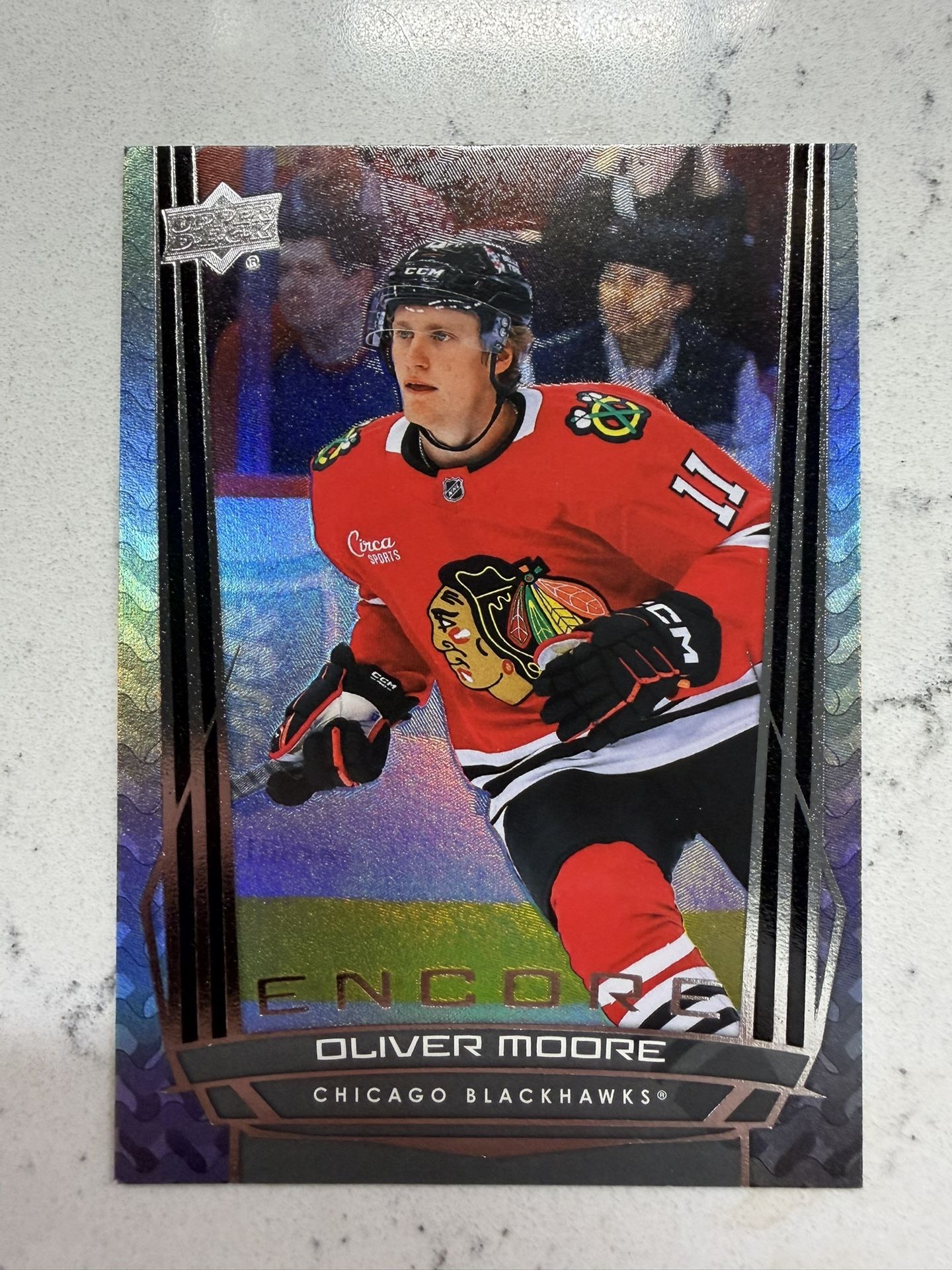 Oliver Moore 2025-26 Upper Deck Series 1 Encore RC #E-92 Blackhawks