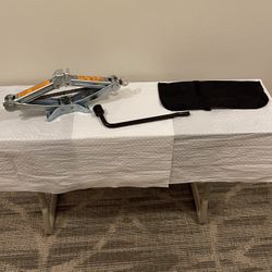 FLOOR JACK, LUG WRENCH, & STORAGE POUCH for NISSAN VERSA - price as posted is firm.