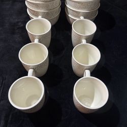 8 white glass bowls with pattern along with 6 white glass mugs for sale 