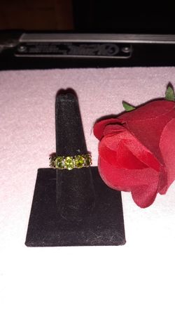 Peridot 5 stone Ladies ring