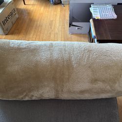 Large beige/tan body pillow