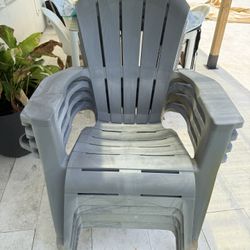 FOUR plastic Adirondack chairs with drink and cell phone holders