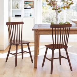 2X Brown solid wood dining chairs