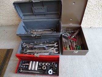 3 tool boxes with tools