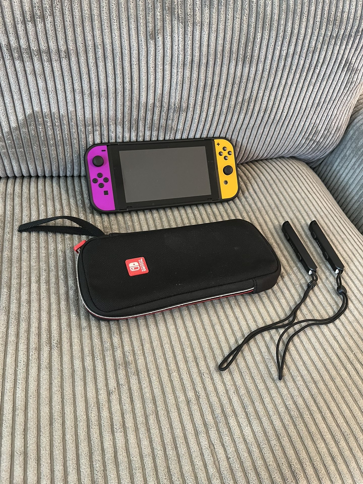 Nintendo Switch Console + Carrying Case + Grip