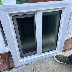 Window Brand new retrofit double glass vinyl bathroom window  Width 20 inches  Height 21.5 inches 