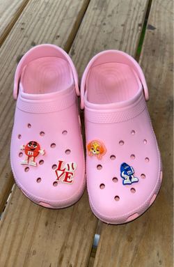 Pink crocs/ sandals with charms