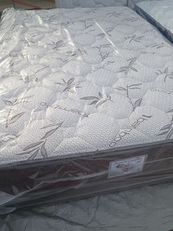 Brand new queen size pillowtop mattress and box spring free delivery depends on location