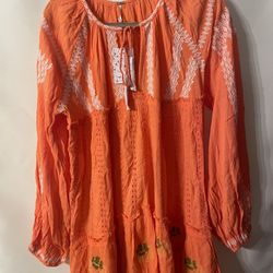 Wild Horses Embroidered Mini Dress in orange.