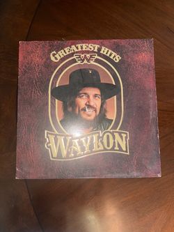 THE GREATEST HITS OF WAYLON 12 INCH VINYL RECORD. Has minor static, does not skip. Cover has wear