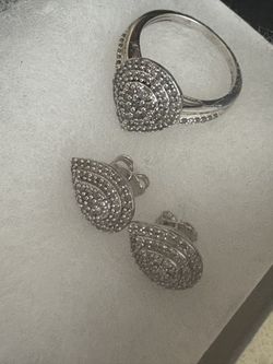 1/2 Karat Pear Diamond Ring and Pear Diamond Earrings.