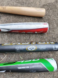 Baseball bats, helmet and gloves