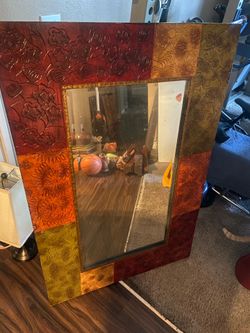 Big mirror has minor cosmetic wear on Coners