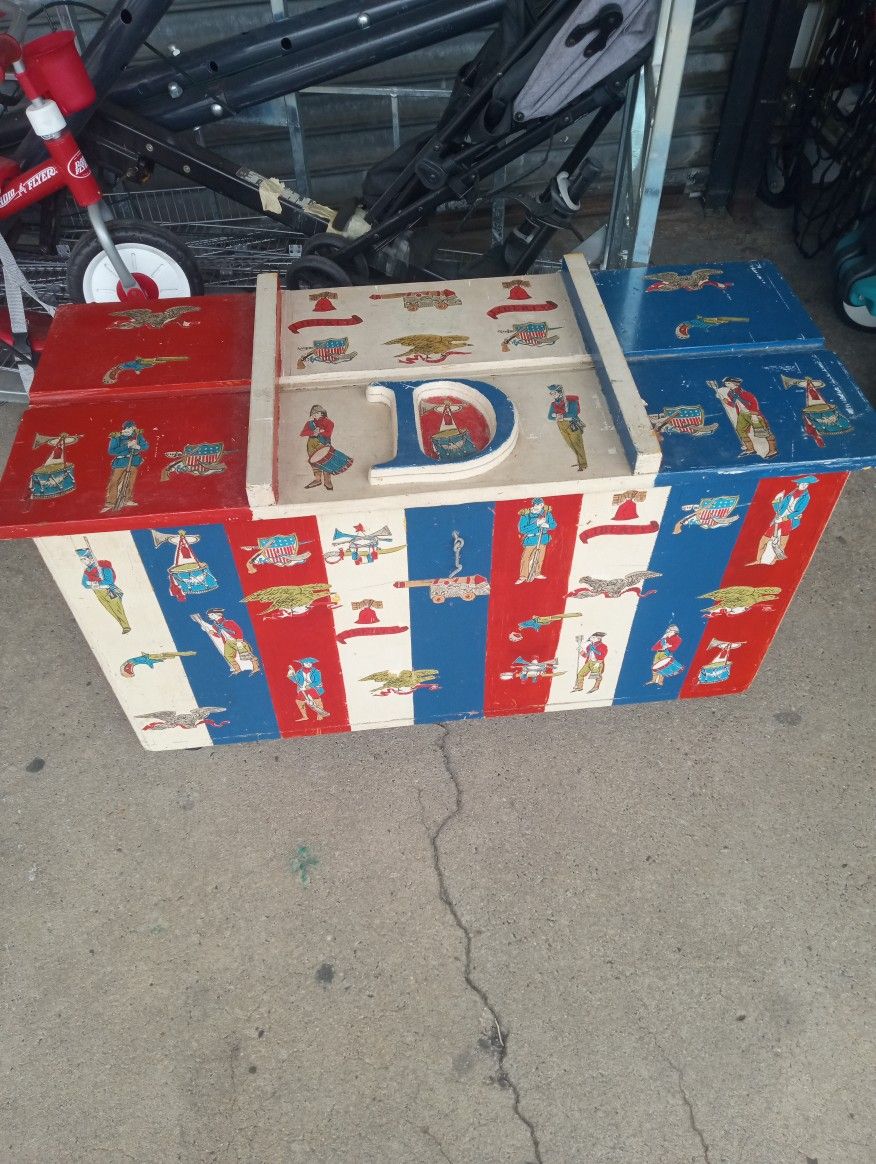 One of a kind toy box/storage box/trunk with wheels easy to move around