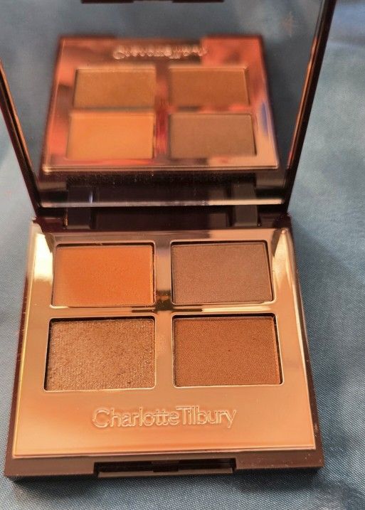 Charlotte Tillbury Golden goddess eyeshadow palette with gold and bronze shades $60 Retail