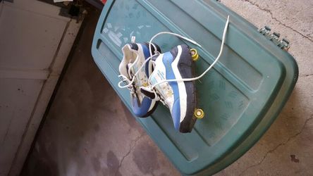 Shoes with wheels that go up and down