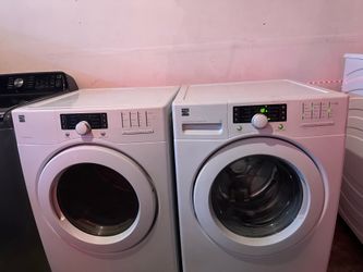 Kenmore front load stackable washer and dryer set like new
