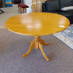 Blonde Wood Dropleaf Pedestal Dining Table
