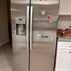 GE Stainless Steel Side-by-Side Refrigerator with Water/Ice Dispenser