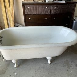 Vintage Cast Iron Claw Foot Bath Tub with vintage Faucets and Plumbing 60”x30”x22”
