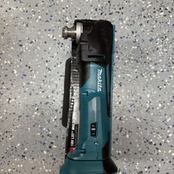 Makita 18V LXT Lithium-lon Cordless Variable Speed Oscillating Multi-Tool (Tool-Only) With Blade and